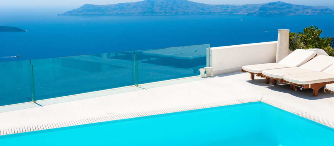 White,Architecture,On,Santorini,Island,,Greece.,Luxury,Swimming,Pool,With